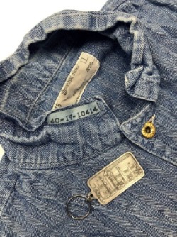 Gary Nelson’s coveralls with his employee identification number sewn into the collar and his key ring for plant keys.