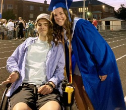 Adeline Rammer, in 2019, celebrates her graduation from Craig High School with her brother, Max.