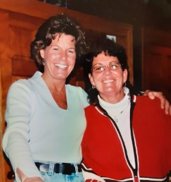 Judy Ludwig Scott, paint supervisor main color booth, joins her team in the Janesville General Motors paint department in 1993