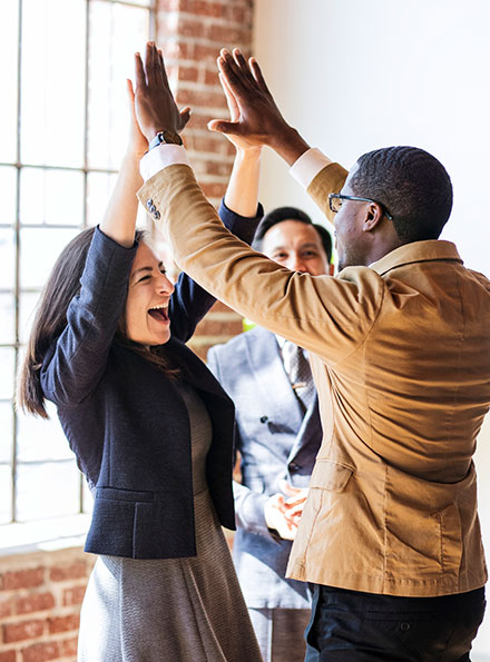 Work team doing a high five