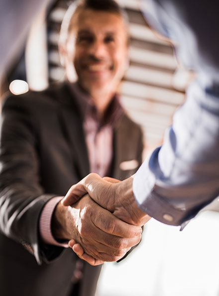 Two businessmen shaking hands