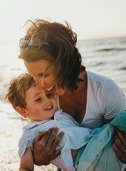 Mother and son at beach