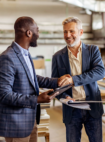 Two businessmen shaking hands
